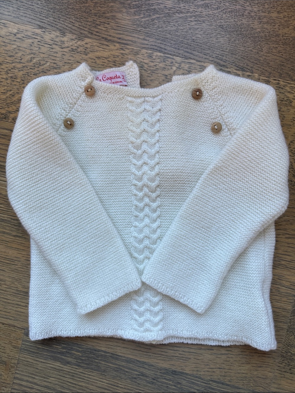 La Coqueta button back sweater